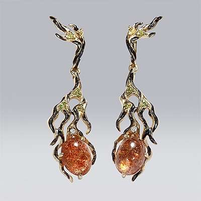 Серьги с цаворитом 765